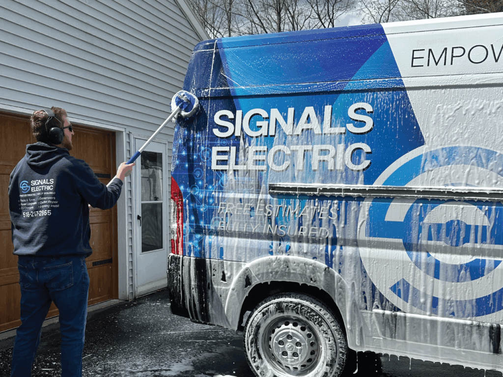 Patrick the Owner washing the Company Van