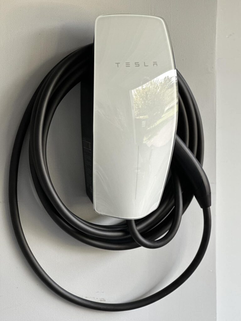 Tesla Wall Connector home EV charger installation by Signals Electric in Saratoga and Glens Falls NY